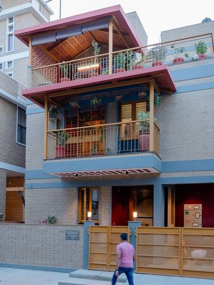 A view of the house with its solar panels, a key feature of its sustainable design.