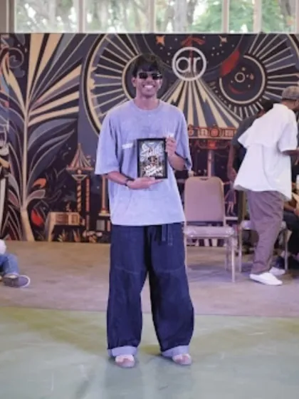 The winner of the 1v1 House battle at Spectra 2025, holding his trophy. The competition was fierce, but the sense of community and celebration was even stronger.