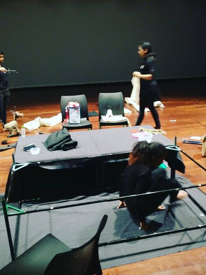 A wider view of our stage setup. We bring our own portable stage, ensuring a professional setup for every venue.