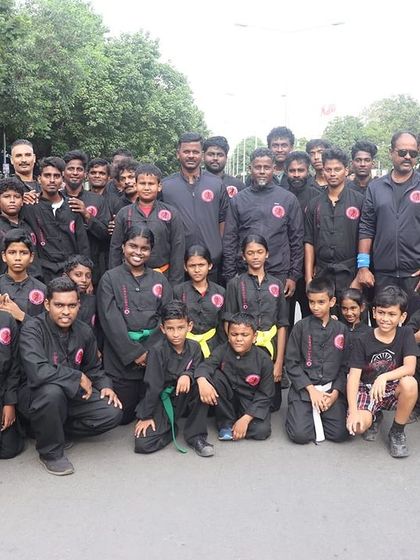 A large group photo of our students who participated in the "Happy Streets" event, showcasing our academy's strong community presence.