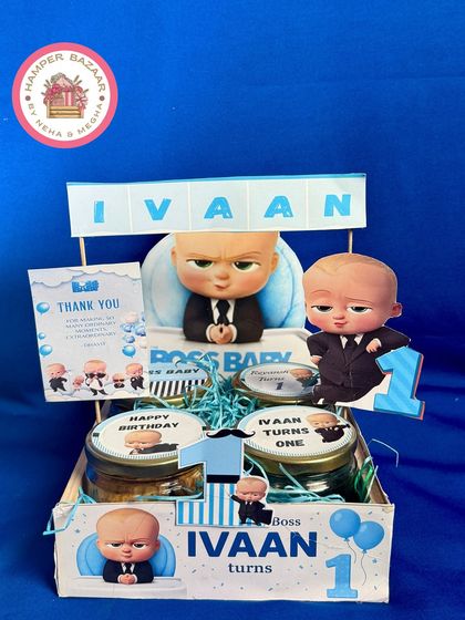 This Boss Baby hamper for Ivaan's first birthday is packed in a pinewood crate with themed jars and a thank you note.