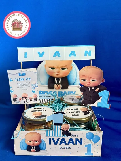This Boss Baby hamper for Ivaan's first birthday is packed in a pinewood crate with themed jars and a thank you note.