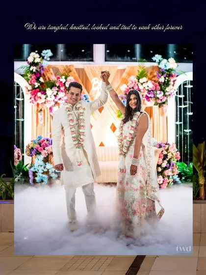 "Tangled, knotted, locked and tied to each other forever." The couple celebrates after their ceremony, standing on a cloud of smoke.