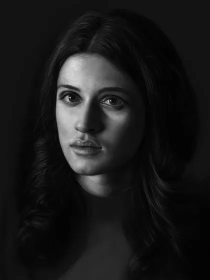 Another progress shot of Yennefer, where I have started to render her hair and refine the shadows on her face, moving closer to the final realistic look.