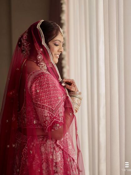 Capturing the elegance of this bride from every angle. Her look features a dewy base and soft, shimmering eyes, creating a magical and timeless effect.