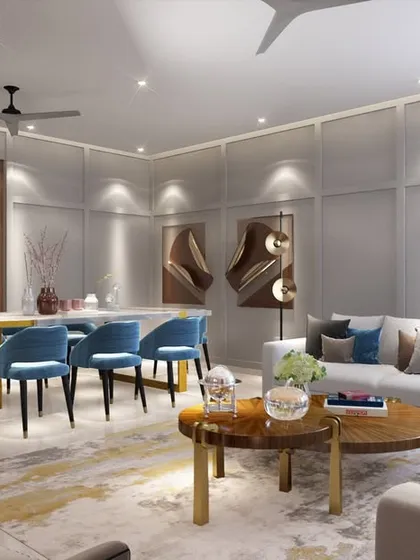 We designed this living and dining room with a subtle color palette and ample lighting to create a cozy family space. A beautiful carpet separates the seating area, while art pieces add a touch of pizzazz.