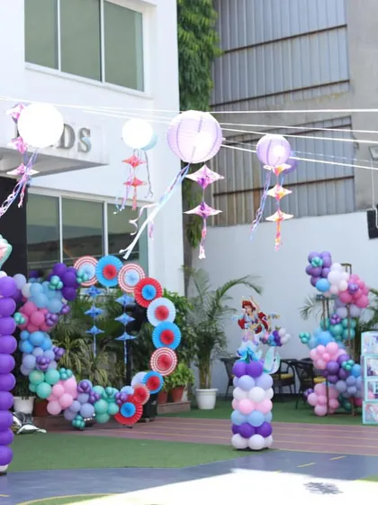A wide view of the mermaid-themed party decorations outside the Oxford Kids building.