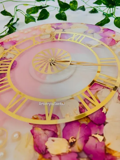 The glossy finish of the resin protects the delicate petals and gives the clock a luxurious feel. This is a memory that will truly stand the test of time.