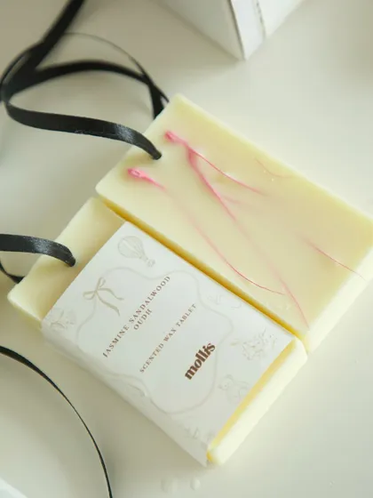A close-up of the beautifully scented wax tablet, a perfect addition to any closet or drawer.