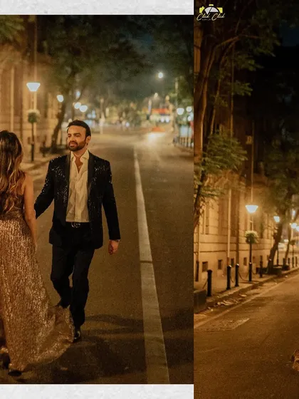 A glamorous shot of the couple walking down a Mumbai street at night, her sparkling dress catching the city lights.
