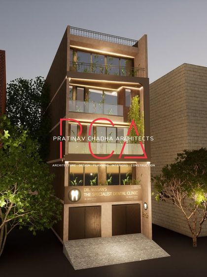 A nighttime render of the Mukherjee Nagar residence, illustrating how the facade and landscape lighting will create a warm and secure environment.