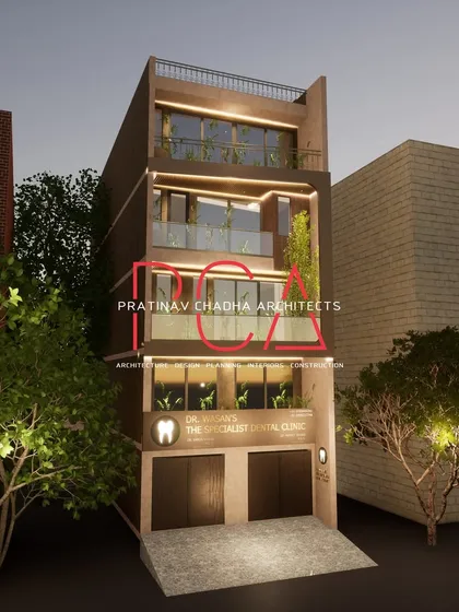 A nighttime render of the Mukherjee Nagar residence, illustrating how the facade and landscape lighting will create a warm and secure environment.