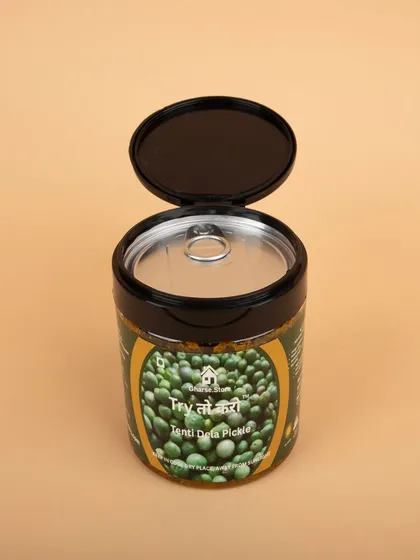 An open-lid shot of the Tenti Dela Pickle.