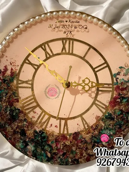 The same beautiful clock, showing how it captures time and memories all in one. It's a perfect blend of sentimentality and practicality for any newlywed's home.