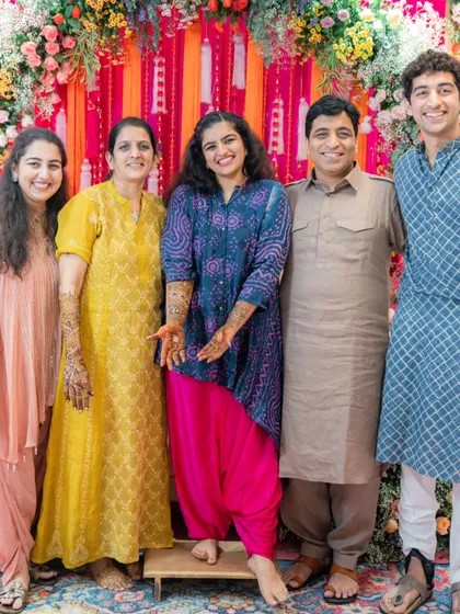 A full family photo from the Mehendi ceremony. I styled each member in comfortable, colorful Indian wear, from kurtas to salwar kameez sets, ensuring everyone looked festive and felt great.