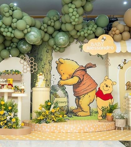 A full view of a Winnie the Pooh themed baby shower. The gentle theme and color palette are perfect for welcoming a new baby.