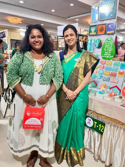 A happy moment with a customer at the Ghe Bharari exhibition. It's always great to connect with people who appreciate handmade art.