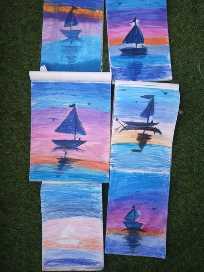 A collection of sunset and boat paintings by my students. They did a great job capturing the reflection of the sky on the water.