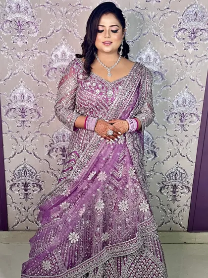 Stepping into a lilac fantasy. This enchanting makeup look with shimmery purple tones was perfect for her engagement celebration.
