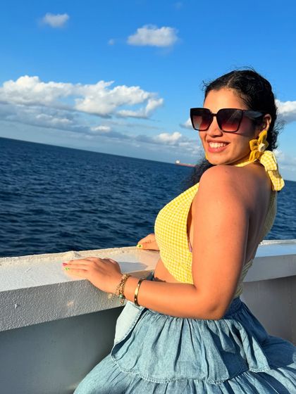 A happy, smiling shot, looking back at the camera. This is a perfect 'wish you were here' vacation photo.