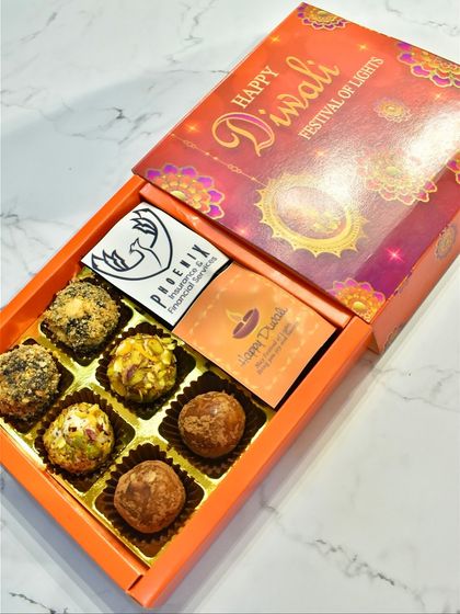 A custom corporate Diwali gift box for Phoenix. This hamper includes an assortment of my handcrafted gourmet truffles alongside branded cards for a personal touch.