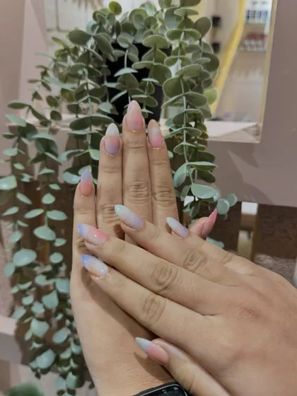 A dreamy pastel ombré, blending soft pinks, purples, and blues for a unicorn-inspired look.