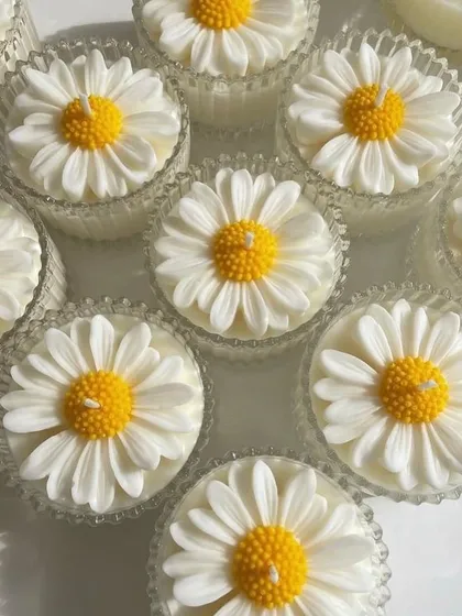 We can make these daisy candles in different fragrances and colors to match your preference. They are very popular for bulk gifting.