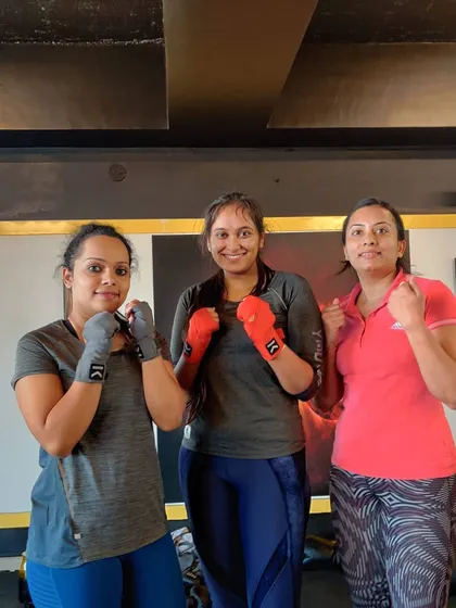 I'm incredibly proud of the strong and dedicated women who train with us. My women's kickboxing classes are a space to build confidence, learn practical self-defense skills, and discover your own strength and grit.