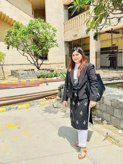Outside Rohini Court, soaking in some positive vibes before heading in for a hearing.