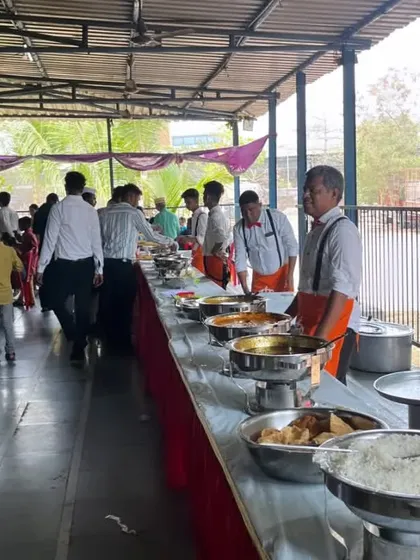A wide view of a busy lunch buffet. This shows my capacity to serve a large number of guests smoothly during peak meal times.