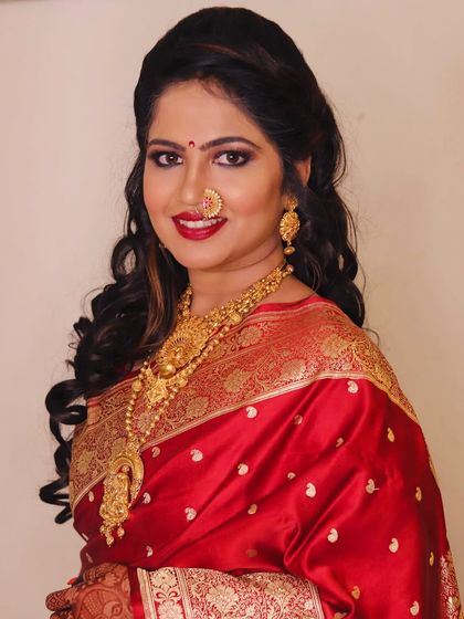 A beautiful Maharashtrian bride ready for her reception. To help your own bridal makeup day go smoothly, remember to prep your skin, be on time, and most importantly, trust your artist to work their magic.