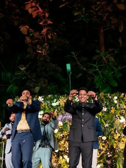 The groomsmen's group showing off their moves. The key is to choose steps that are fun and easy for everyone to remember.