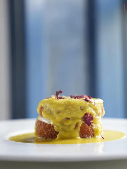The plated Shahi Tukda, with saffron rabri cascading over the crispy bread. It’s a royal dessert, reimagined for the modern palate.