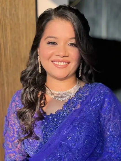 A beaming smile that says it all. A happy client is the best testament to my work.