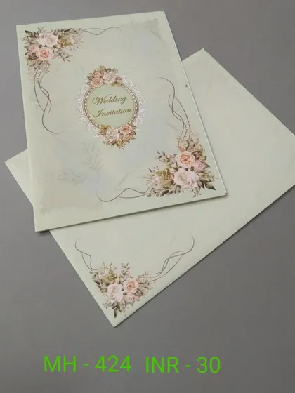 A simple and affordable invitation with a charming floral wreath design. The soft pastel green color makes it a lovely choice for a spring or summer event.