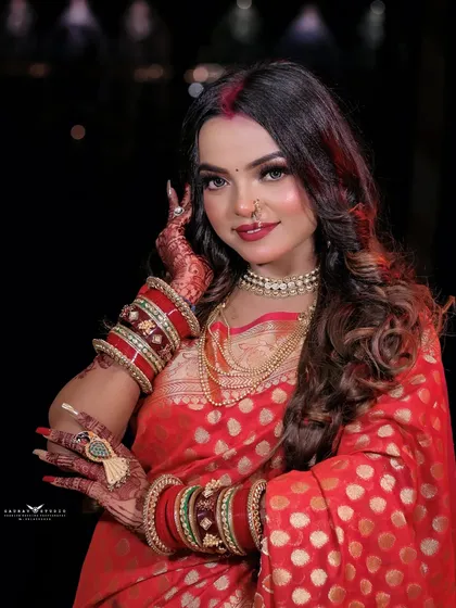 A charming portrait of the model, her smile and pose exuding festive joy.