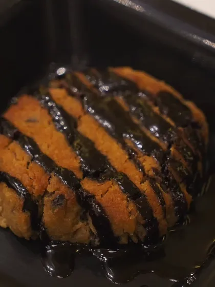 When in doubt, cookie it out. A warm, gooey chocolate chip cookie drizzled generously with rich chocolate sauce.