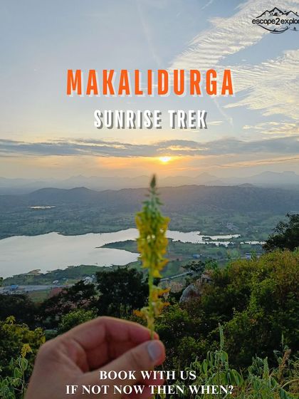 A beautiful shot of the sunrise over the lake as seen from Makalidurga peak, a perfect reward for an early morning trek.