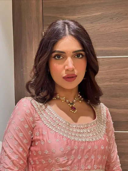 For Ganpati celebrations, I styled Bhumi Pednekar in this lovely pink anarkali suit. The delicate white embroidery and soft fabric make it a comfortable yet festive choice for a day of celebrations.