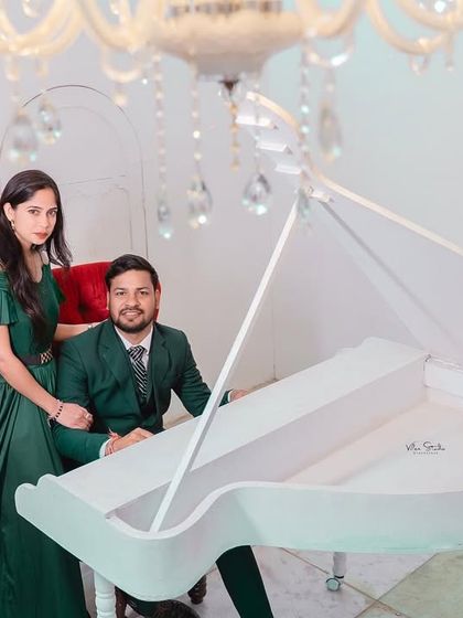 A classic portrait at the piano. This shot is formal and elegant, perfect for a save-the-date card or a framed print.