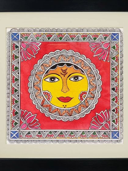 A vibrant depiction of the sun, a recurring symbol of life and energy in Madhubani paintings.