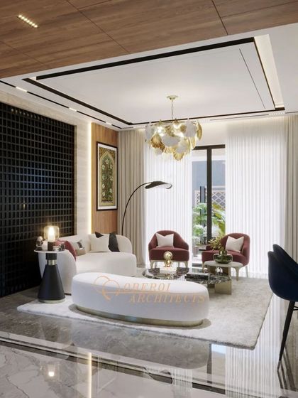 This living room combines classic elegance with modern comfort. The statement chandelier and gridded wall feature add a touch of drama, while the plush seating invites relaxation.