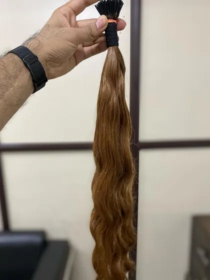 A beautiful bundle of wavy, colored I-Tip extensions, part of our great collection of 100% human permanent hair extensions.