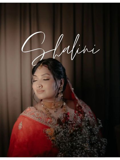 A serene portrait of Shalini, her eyes closed, holding a bouquet of baby's breath, a picture of calm and beauty.