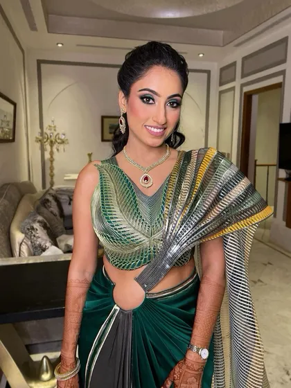 A smiling shot of this modern cocktail look. The makeup is bold and confident, just like her, and it was a pleasure to create this style for her.