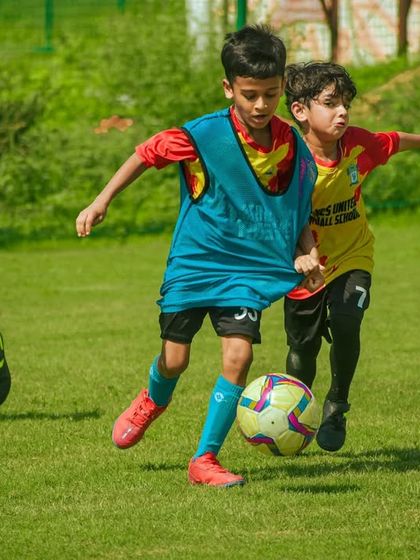 Young players in a mix of jerseys compete for the ball, showing the diversity of teams in our tournaments.