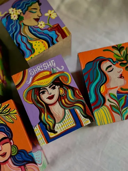 A final look at the variety of womanhood and portrait designs on the custom pen stands.