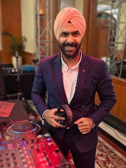 Gig ready and holding my trusted Technics headphones. A simple, classic look before I hit the decks for a wedding party.