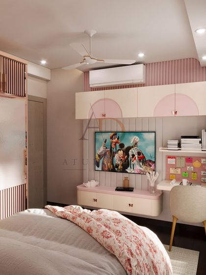 A playful and functional child's bedroom with pink fluted panels, a floating TV unit, and a compact study desk.