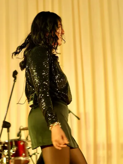 Moving to the music on stage. Our performances are not just about singing, they're about creating a complete visual and auditory experience.